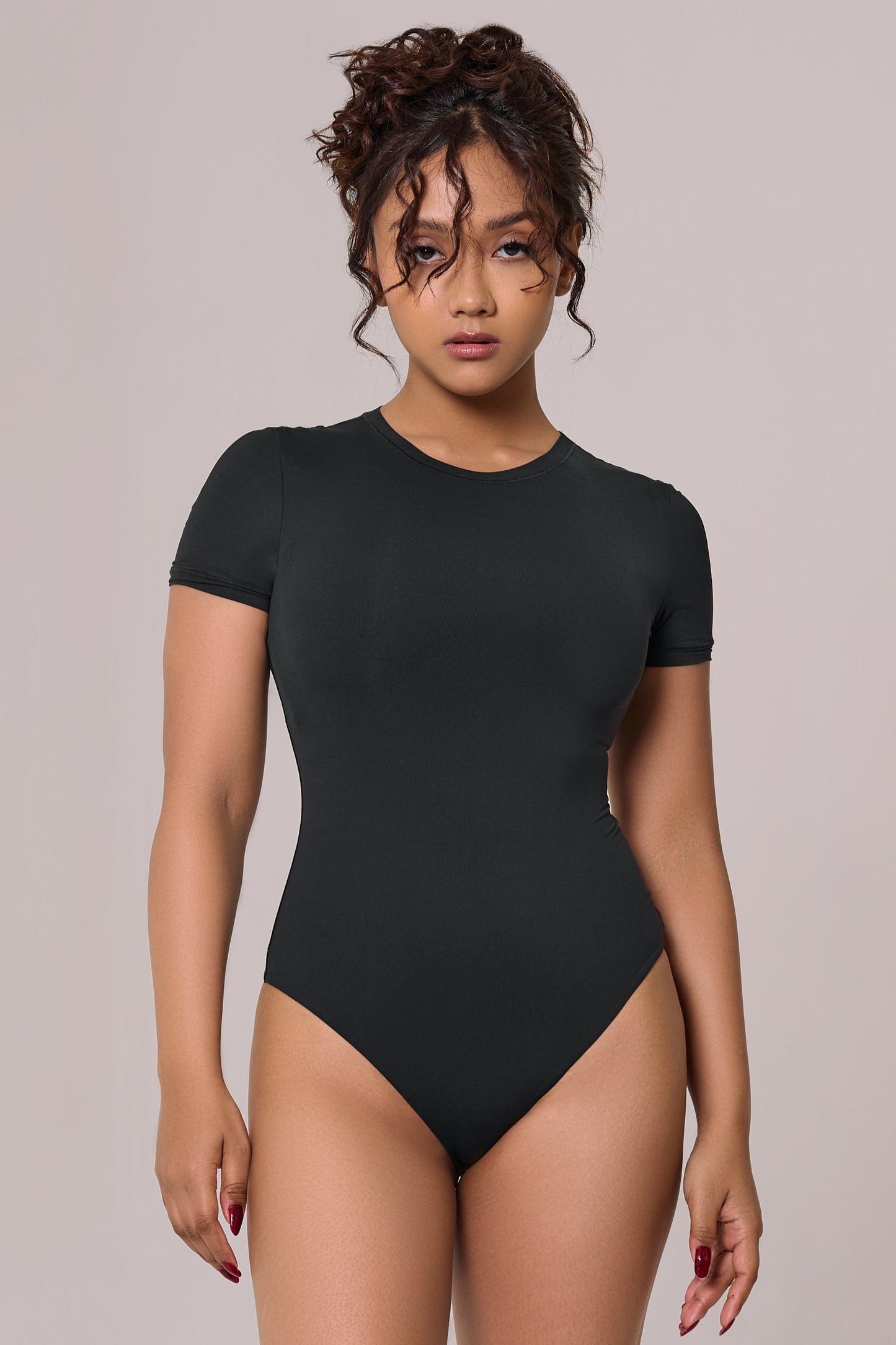 cap sleeves bare bodysuit in black color